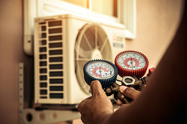Professional Air Conditioning Service technician working in Cuyahoga Falls, OH